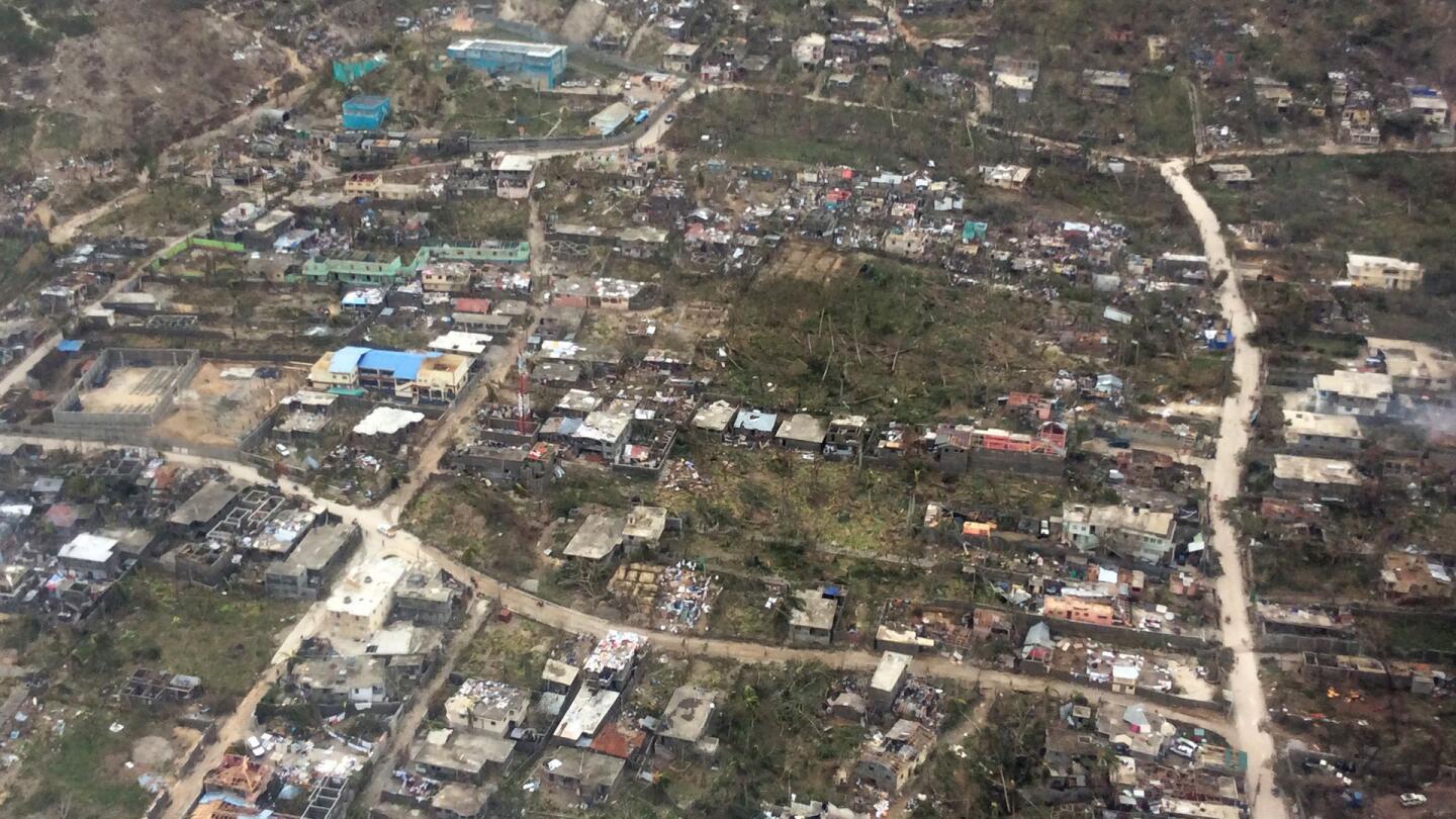This handout photo obtained from the Agency for Technical Cooperation and Development Assistance on October 7, 2016 shows an aerial view of the devasted town of Jeremie, west Haiti, following Hurricane Matthew.