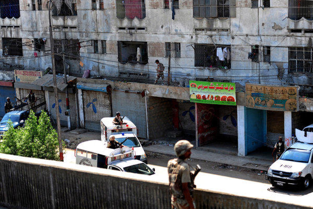 Pakistani paramilitary soldiers cordon off an area during a targeted operation in Karachi. The city has been beset by rampant violence in recent years, but a security crackdown seems to have brought a lull in the bloodshed. Kidnappings for ransom, sectarian attacks and gang warfare have spiraled since 2008.