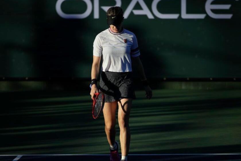 Eugenie Bouchard walks off the court after her loss to Bianca Andreescu in their quarterfinal at the Oracle Challenger Series tennis tournament Friday, Jan. 25, 2019, in Newport Beach, Calif. (AP Photo/Jae C. Hong)
