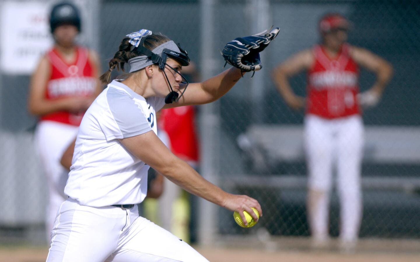 Photo Gallery: Burroughs High School softball breaks game wide open vs. Crescenta Valley High School at top of fifth inning
