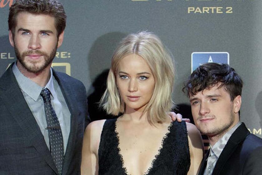 Liam Hemsworth, left, Jennifer Lawrence and Josh Hutcherson in Madrid.