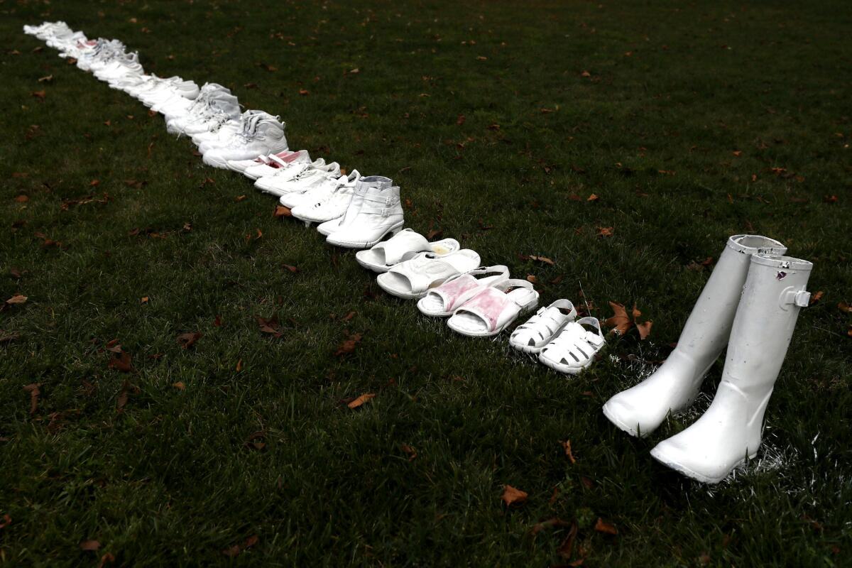 Fifty pairs of white shoes laid in front of All Souls Anglican Church to honor victims who lost their lives during the terror attacks at two New Zealand mosques.