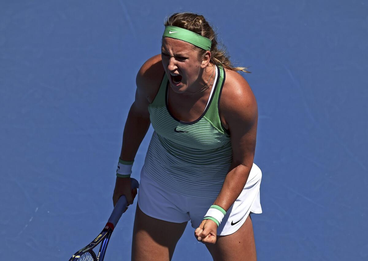 Victoria Azarenka reacts after a point against Barbora Strycova during their fourth-round match of the Australian Open.