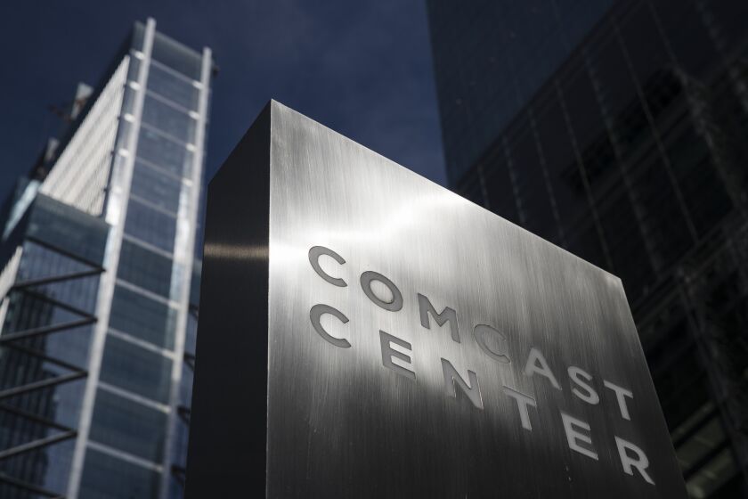 Shown is a sign outside the Comcast Center in Philadelphia, Monday, May 21, 2018. (AP Photo/Matt Rourke)