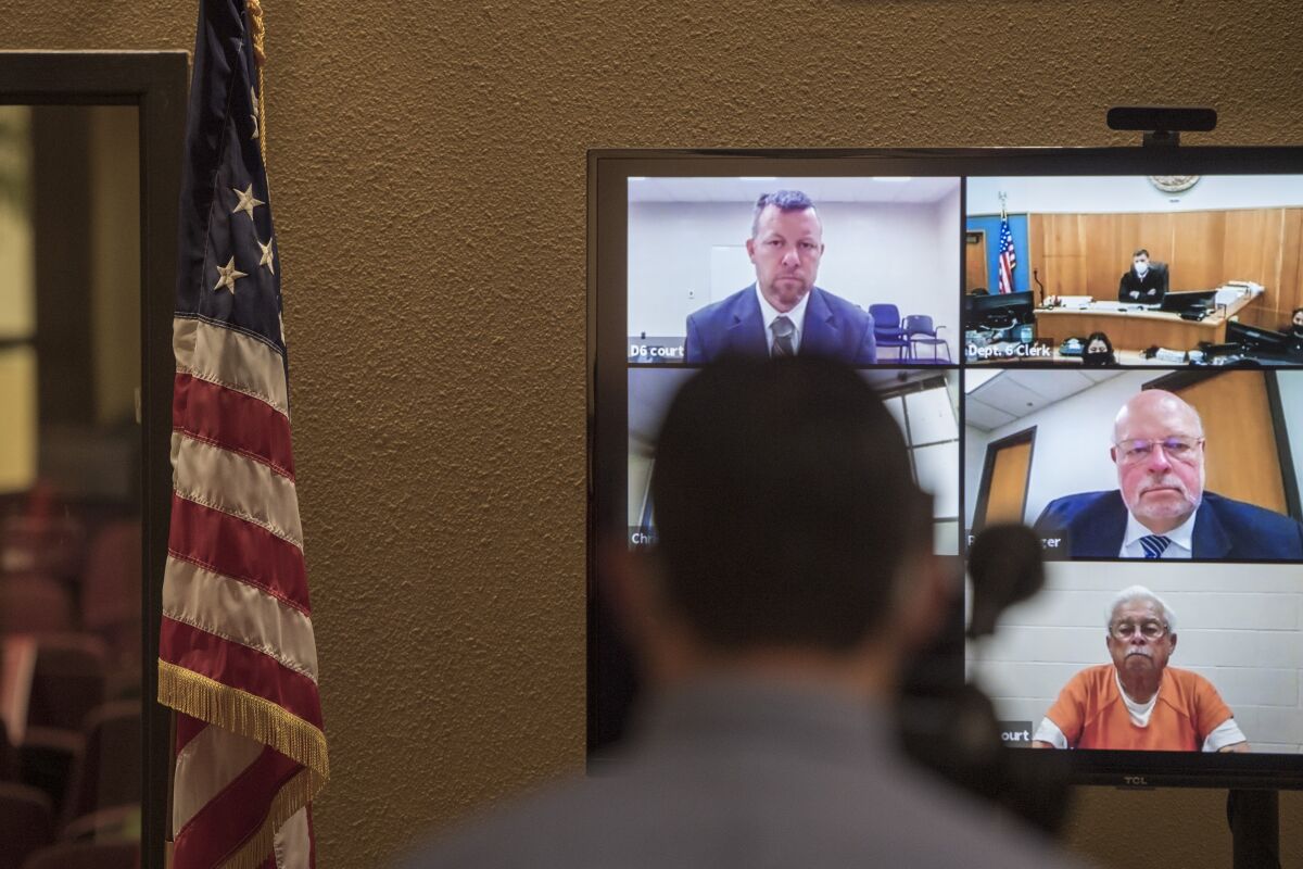 Defendants Paul Flores, top left, and his father Ruben Flores, bottom right, appear via video conference during arraignment