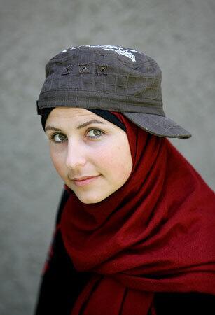 Sama Wareh incorporates head scarves into fashionable outfits.