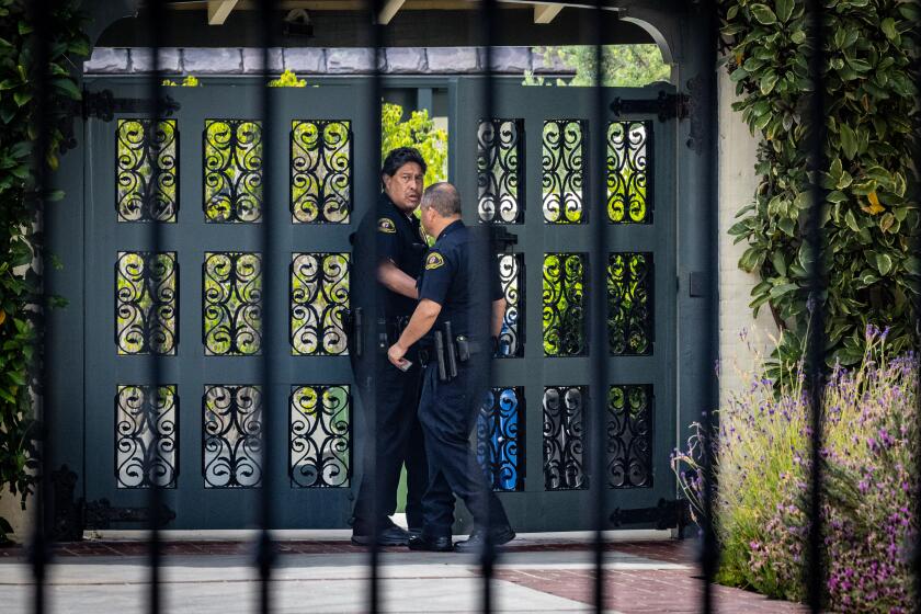 Los Angeles, CA - April 22: Police patrol Getty House, the official residence of the Mayor Karen Bass, where a man was taken into custody for allegedly smashing a glass door and breaking into her home on Monday, April 22, 2024 in Los Angeles, CA. (Jason Armond / Los Angeles Times)