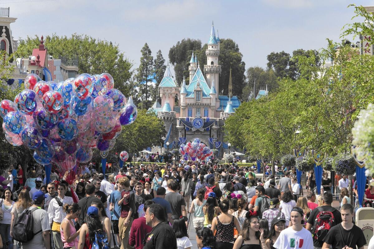 Under Disney’s new pricing policy, visitors to Disneyland, above, and its other parks pay prices ranging from a 4% discount from regular prices on low-demand days to a 20% increase on the busiest days.