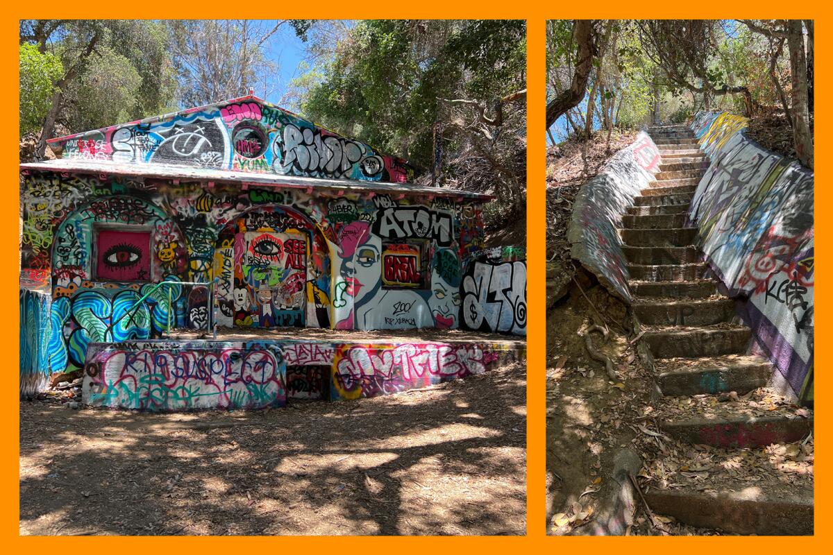 A graffiti-covered house on the left and an outdoor staircase on the right