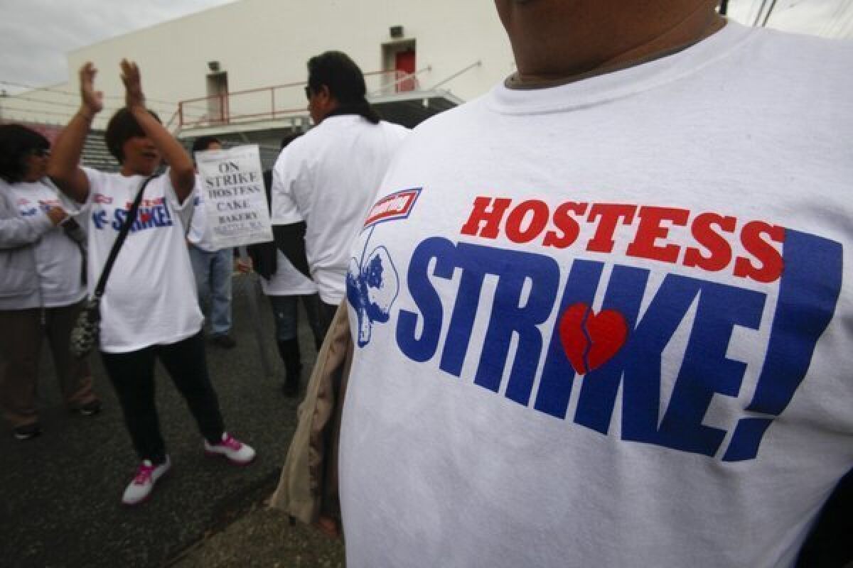 Striking workers picket at the Hostess Bakery in Los Angeles.