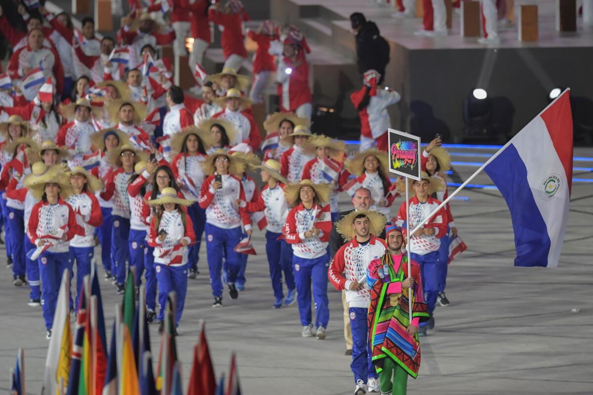 Paraguay's flag-bearer, table tennis player Alejandro Toranzos, leads his delegation during the Parade of Nations of the opening ceremony of the Lima 2019 Pan-American Games at the National Stadium in Lima, on July 26, 2019. - The Pan-American Games run until August 11. (Photo by Pedro PARDO / AFP)PEDRO PARDO/AFP/Getty Images ** OUTS - ELSENT, FPG, CM - OUTS * NM, PH, VA if sourced by CT, LA or MoD **