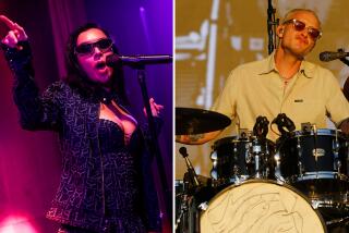 A photo of woman with sunglasses singing into a microphone in a dark room. A photo of a man wearing sunglasses playing drums
