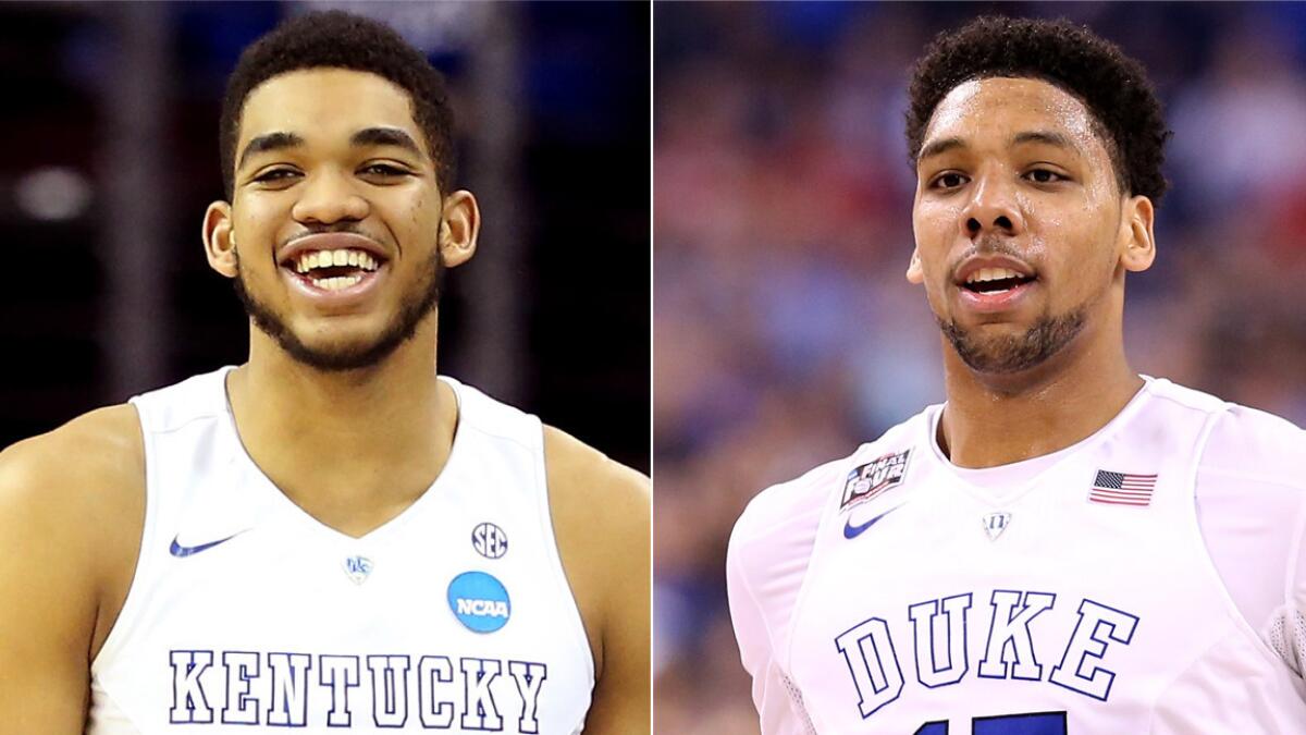 Kentucky's Karl-Anthony Towns, left, and Duke's Jahlil Okafor are on the Lakers' draft radar now that the team secured the No. 2 pick in next month's NBA draft.