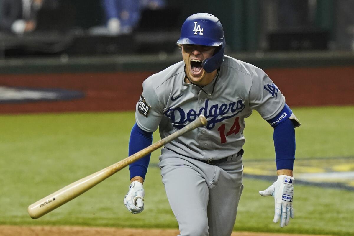 Dodgers second baseman Kiké Hernández celebrates after hitting a run-scoring double in the sixth inning.