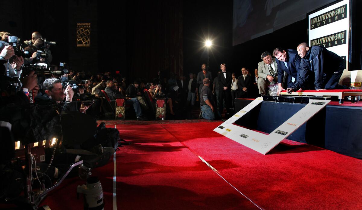 Kobe Bryant becomes the first athlete to have his hands and feet imprinted at the legendary Graumans Chinese Theater in Hollywood on Saturday, February 19, 2011. (Christina House / For the Times)