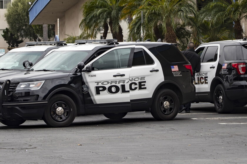 TORRANCE, CA - JANUARY 5, 2019: Torrance police stand guard outside the Gable House Bowl in Torrance