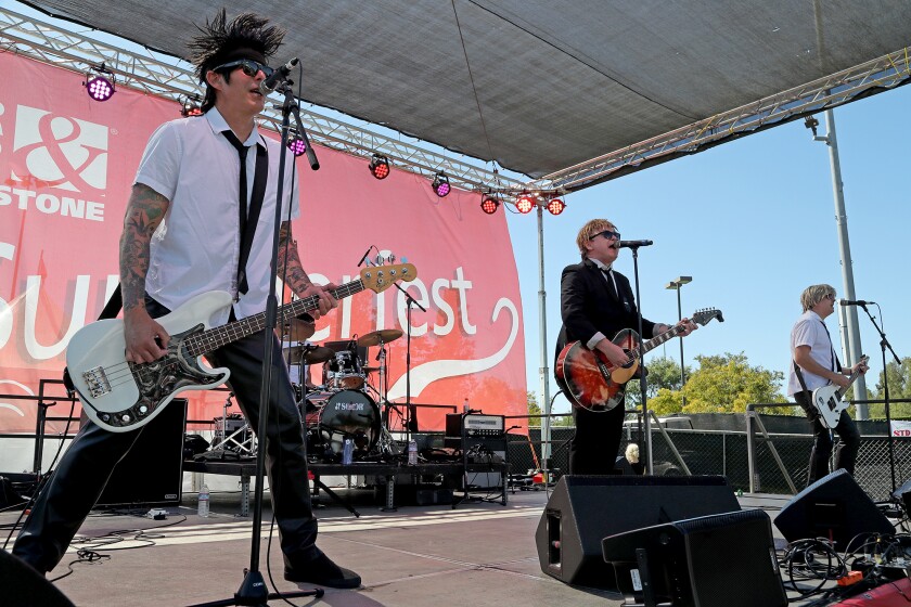 Flashback Heart Attack performs live during Summerfest at Fountain Valley Sports Park on Saturday.