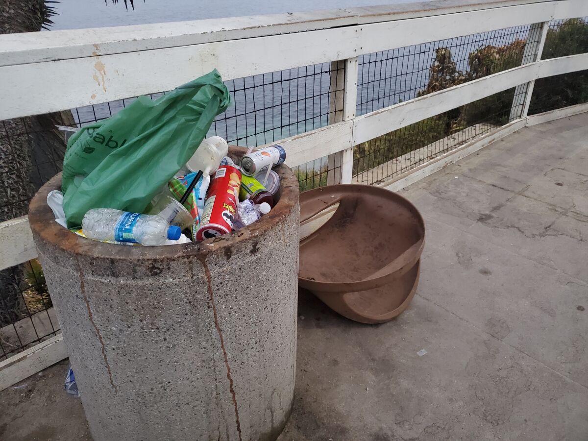 Reader Donna Murphy writes that scenes like this around coastal walkways and parks give La Jolla "a very seedy appearance."