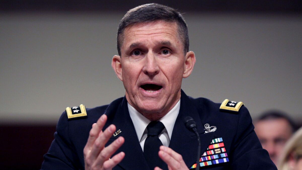 Michael Flynn, then-director of the Defense Intelligence Agency, testifies on Capitol Hill in 2014.