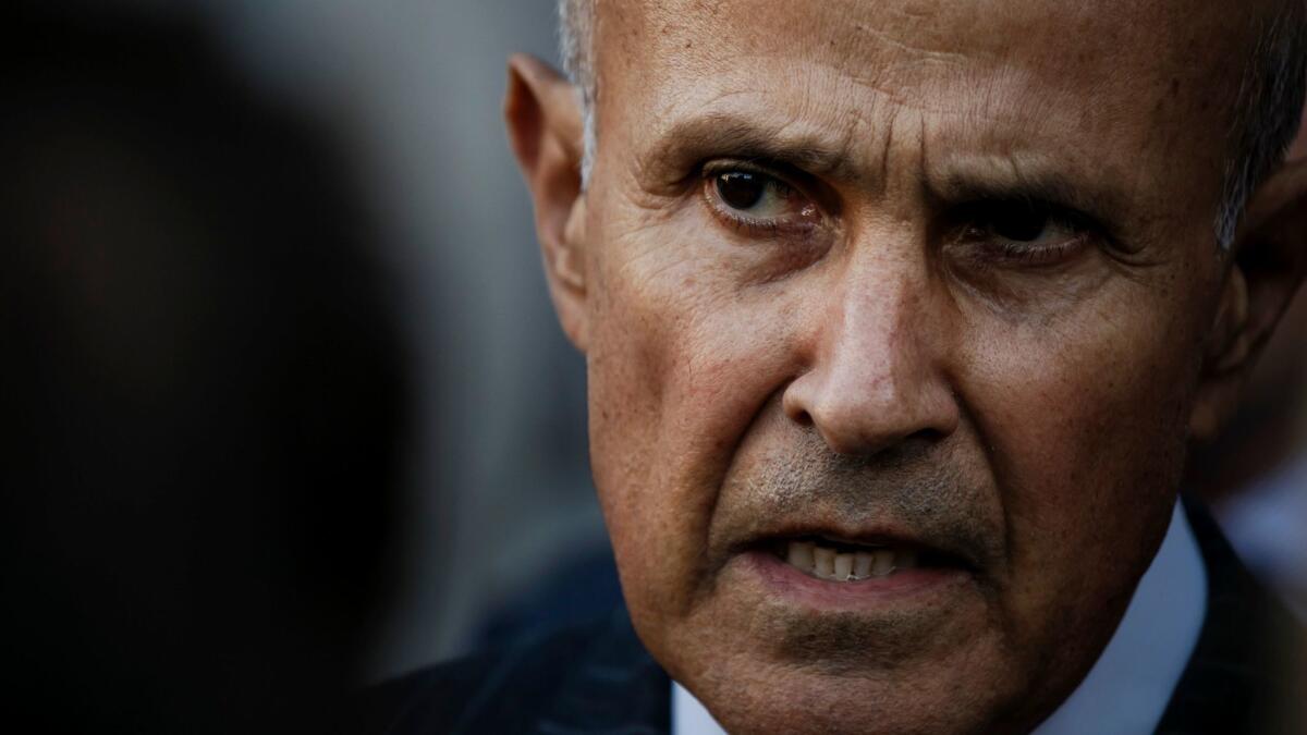 Former Los Angeles County Sheriff Lee Baca talks to reporters outside the federal courthouse earlier this week after his obstruction case ended in a mistrial, with jurors hopelessly deadlocked.