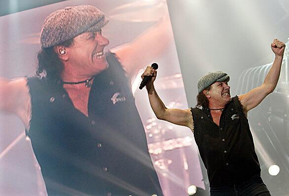 Brian Johnson of the rock band AC/DC brings its sexagenarian heavy metal to the Los Angeles Forum in Inglewood on Saturday.