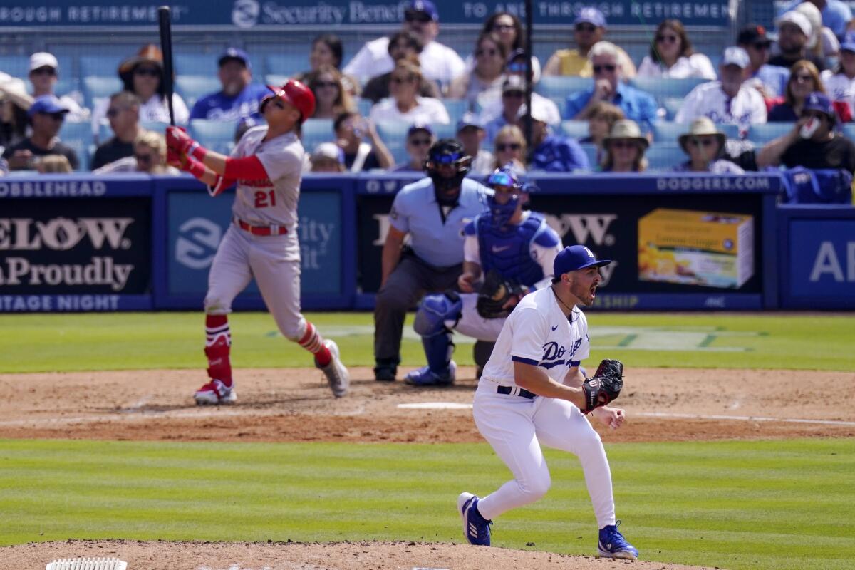 Dodgers' Alex Vesia celebrates after striking out Cardinals' Lars Nootbaar in the seventh inning Sunday at Doger Stadium.