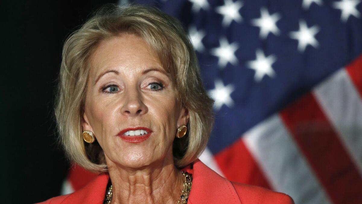 Education Secretary Betsy DeVos, shown in 2017, was slapped down by a federal magistrate over loan forgiveness for students defrauded by for-profit colleges.