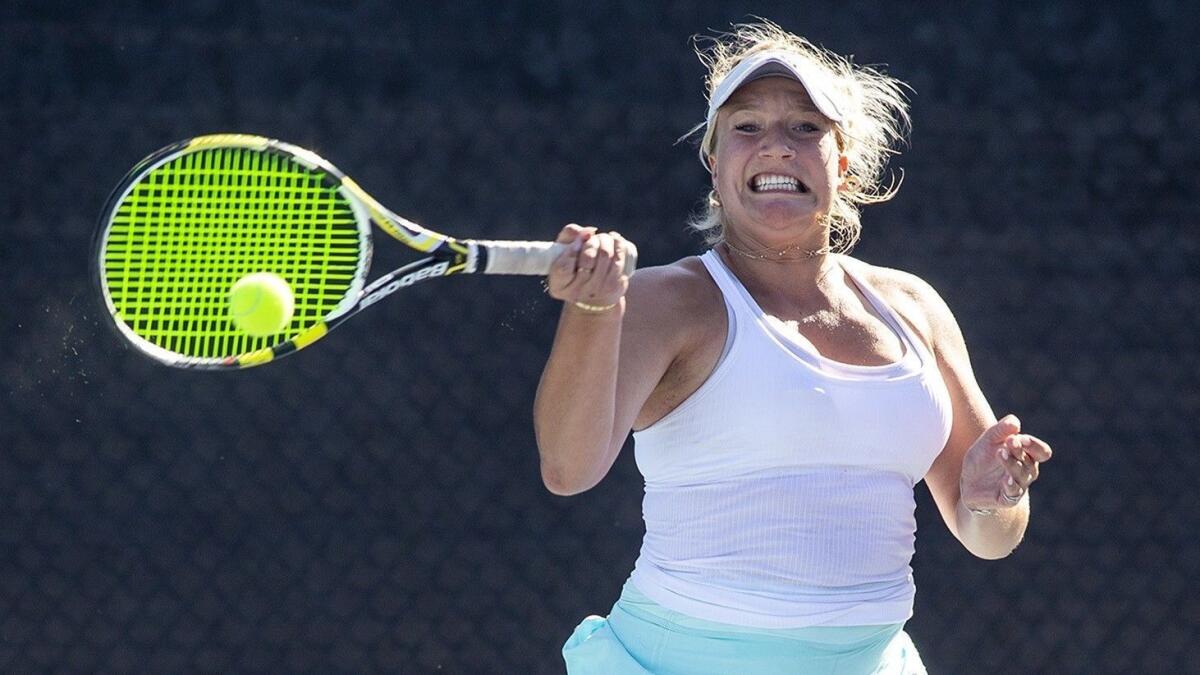 Kristina Evloeva, shown returning a shot against Palos Verdes High on Sept. 12, plays at No. 1 singles this season for the Corona del Mar girls' tennis team.