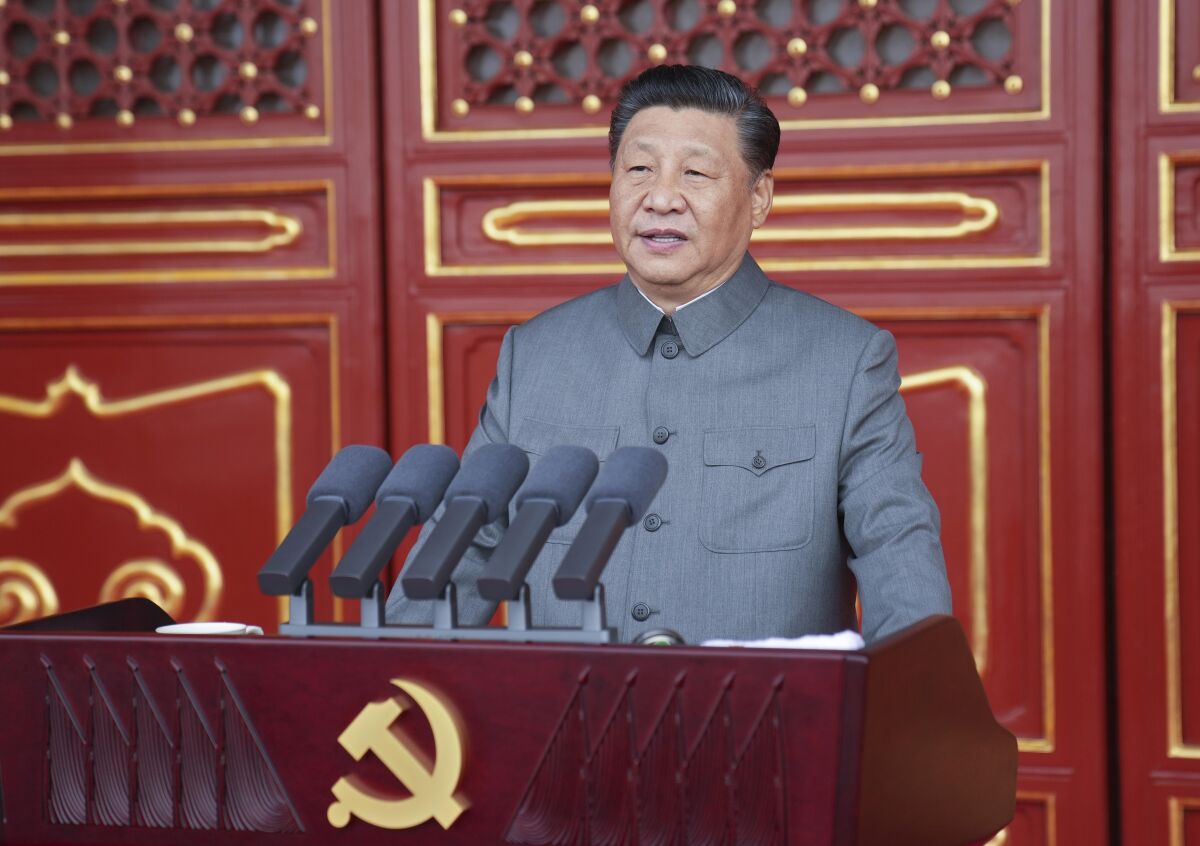 Chinese President Xi Jinping at lectern