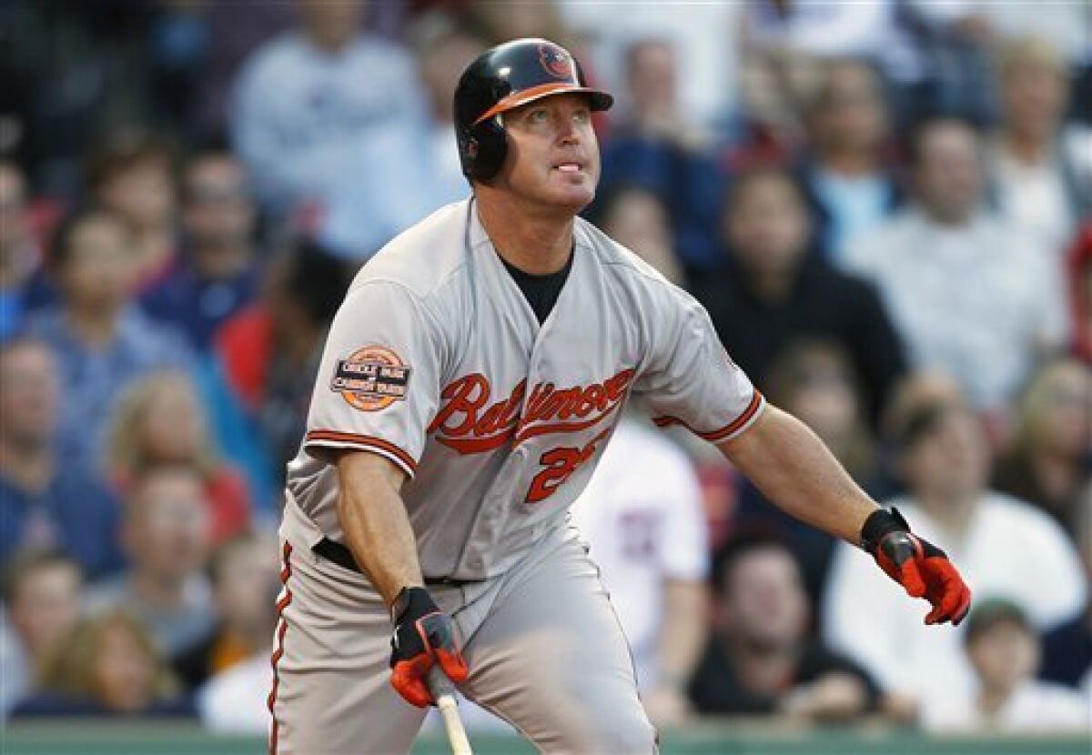 Baltimore Orioles' Jim Thome watches his ground-rule double that drove in the go-ahead run in the 12th inning of a baseball game against the Boston Red Sox in Boston, Saturday, Sept. 22, 2012. The Orioles won 9-6. (AP Photo/Michael Dwyer)