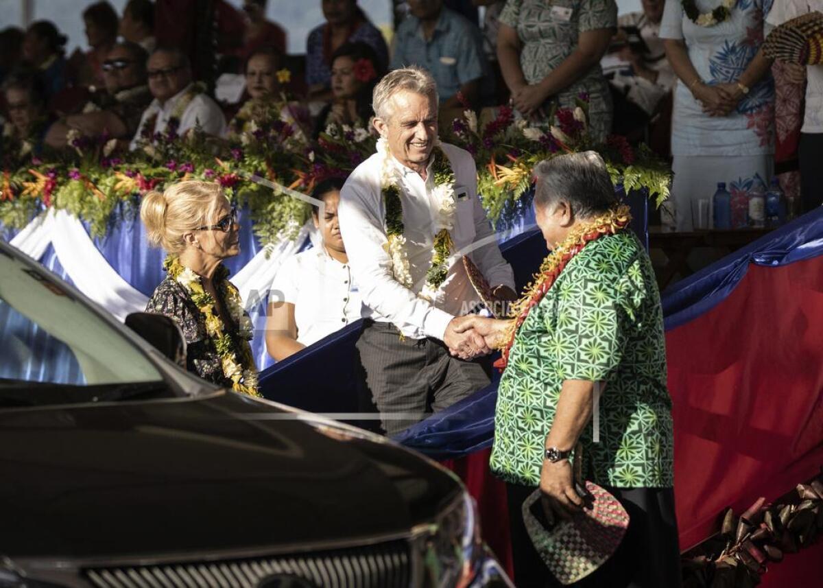 Samoa Prime Minister Tuilaepa Sailele Malielegaoi, right, greets  Robert F. Kennedy Jr. in Mulinu'u, Samoa, on June 1, 2019