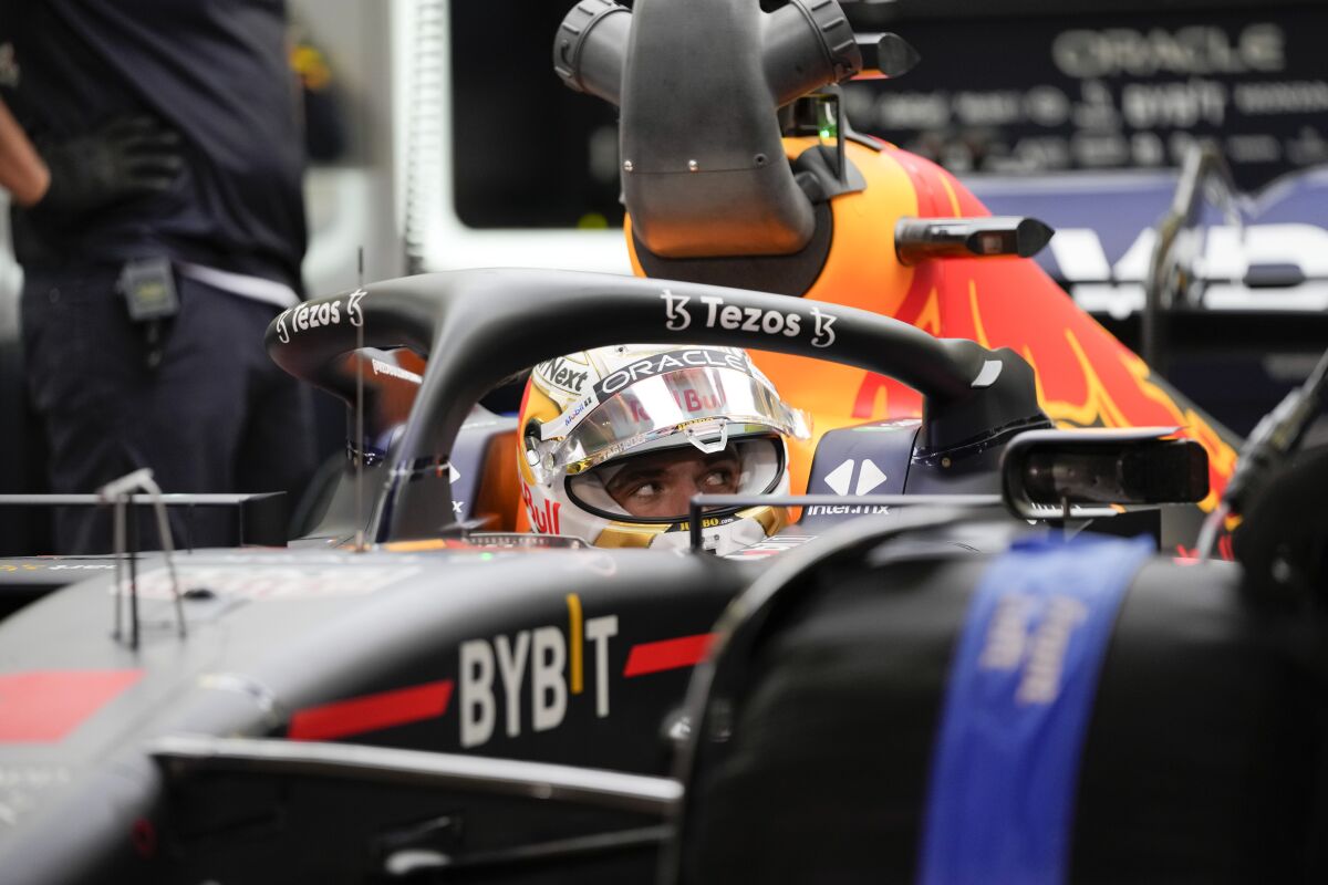 Red Bull driver Max Verstappen of the Netherlands gets ready during a practice for theFormula One Bahrain Grand Prix it in Sakhir, Bahrain, Friday, March 18, 2022. (AP Photo/Hassan Ammar)