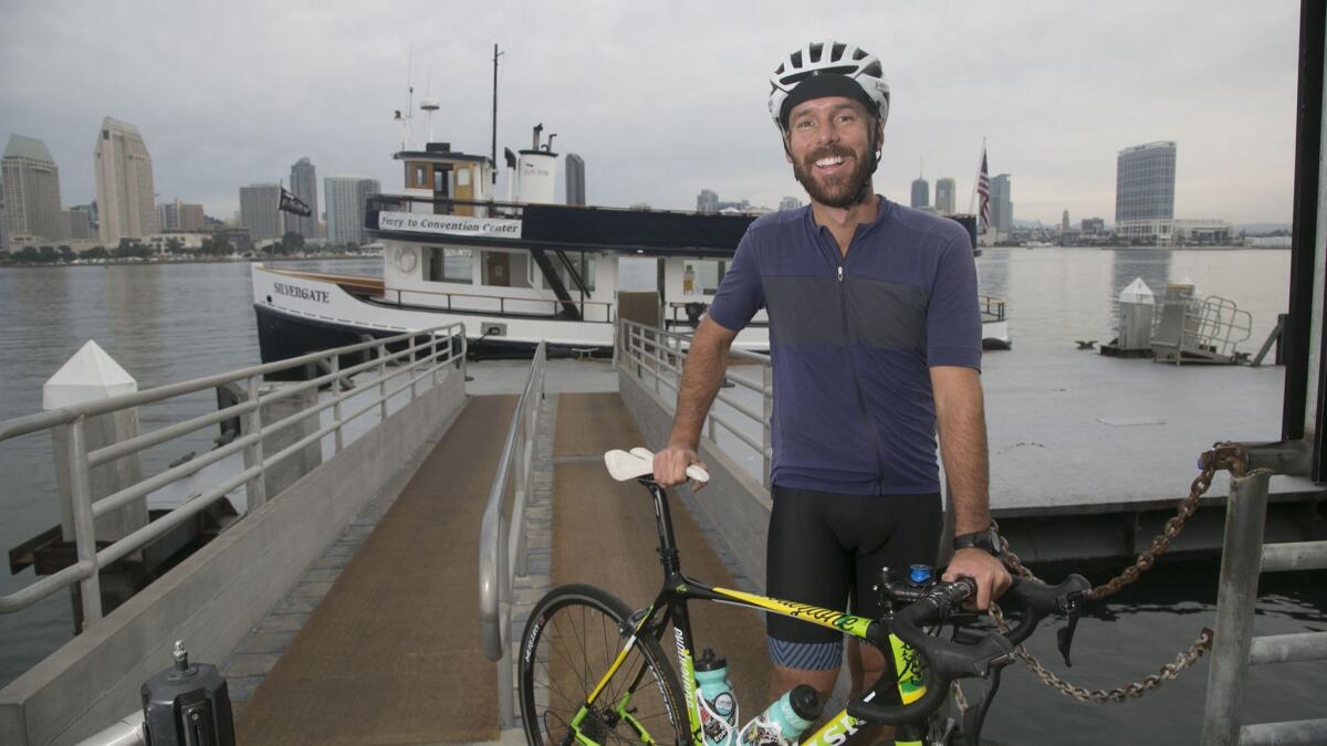 Andrew Stout completed a cross-county bicycle trip last year from Maine to California to honor his father, who had always wanted to do the trip but died from brain cancer.