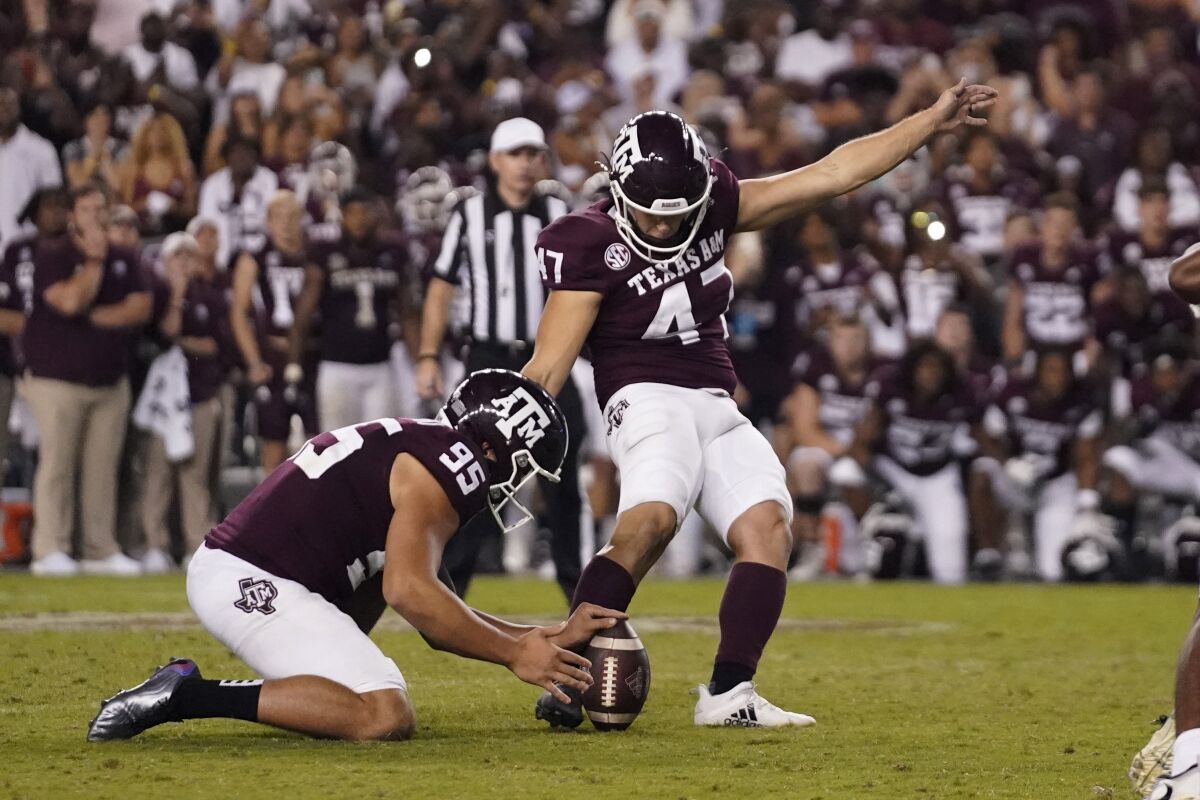 Texas A&M's Seth Small (47) kicks a field goal against Alabama for the win at the end of an NCAA college football game Saturday, Oct. 9, 2021, in College Station, Texas. (AP Photo/Sam Craft)