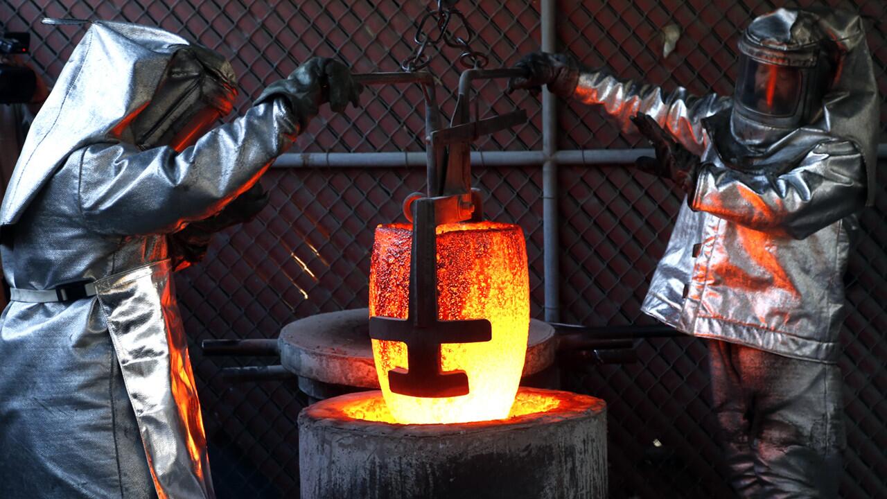 A vat of molten bronze is raised prior to pouring in Burbank at the American Fine Arts Foundry, where the solid bronze Actor statuettes are being cast for the Screen Actors Guild Awards to be presented Jan. 13.