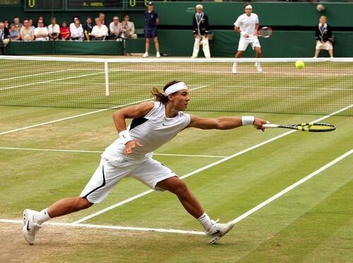 Nadal reaches for a shot from Roger Federer during the Men's Singles final of Wimbledon.