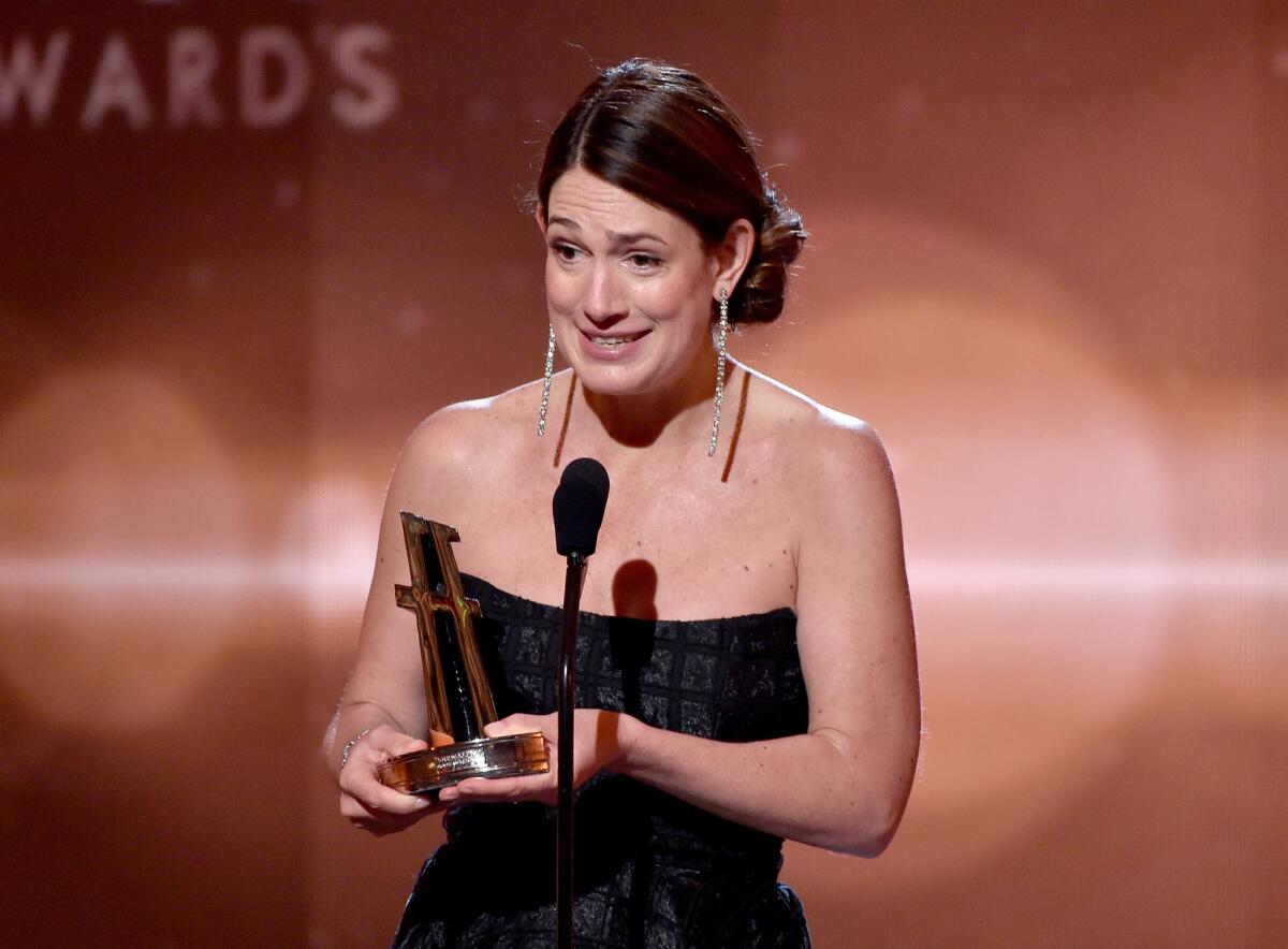 Gillian Flynn accepts the Hollywood screenwriter award for "Gone Girl" at the Hollywood Film Awards Friday evening.