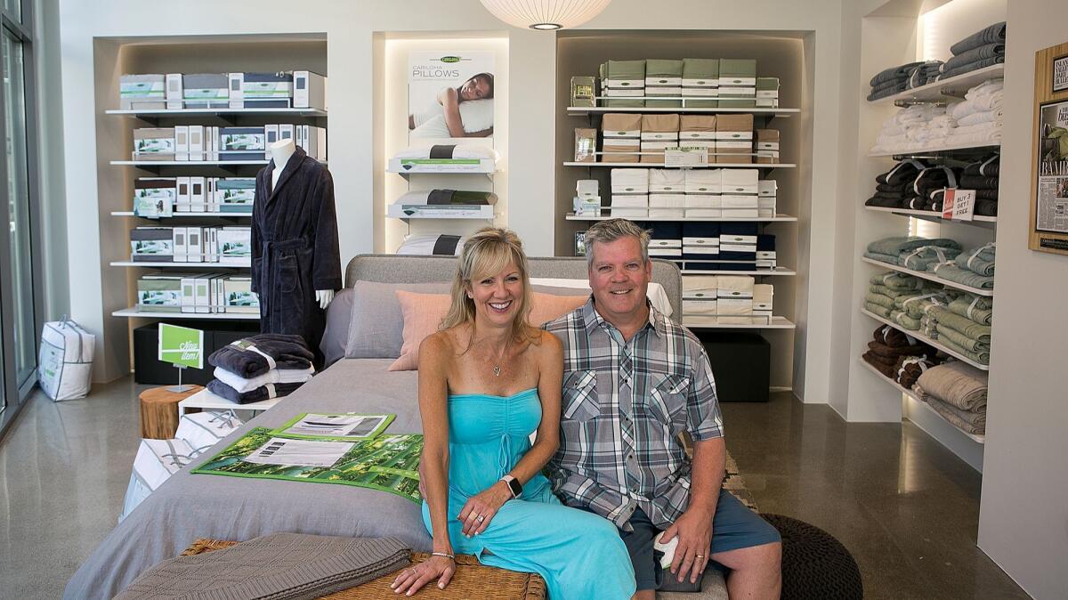Kevin and Lisa Long opened their first business this year, Cariloha at the Pacific City mall in Huntington Beach.