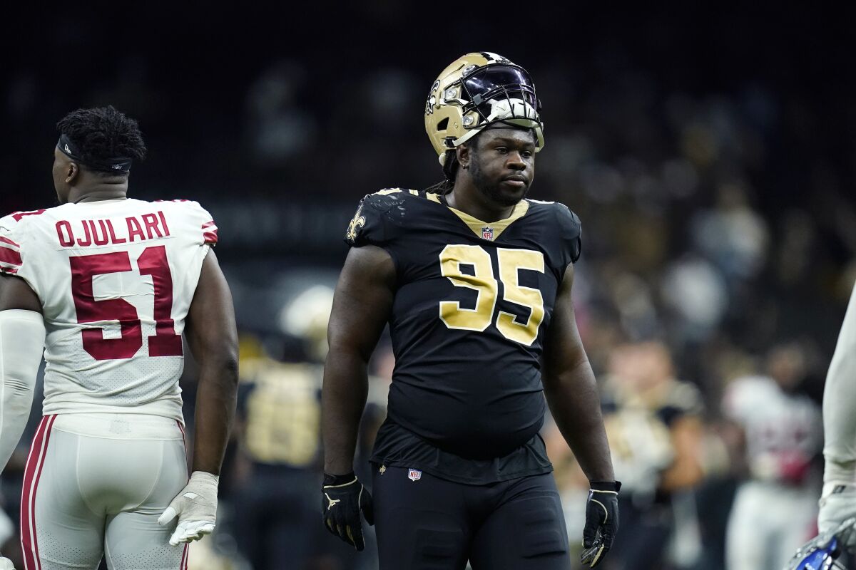 New Orleans Saints defensive tackle Ryan Glasgow (95) reacts after losing on overtime ti the New York Giants during an NFL football game in New Orleans, Sunday, Oct. 3, 2021. The Giants won 27-21. (AP Photo/Brett Duke)