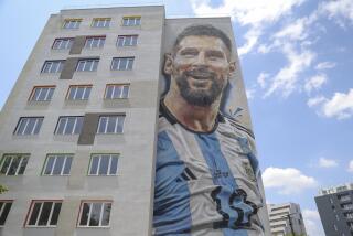 A mural with Argentinian soccer superstar Lionel Messi, is painted on a building in Tirana, Albania, on Thursday, June 8, 2023. The 25x10 meters Messi's mural is part of the Tirana MuralFest 2023. (AP Photo/Llazar Semini)