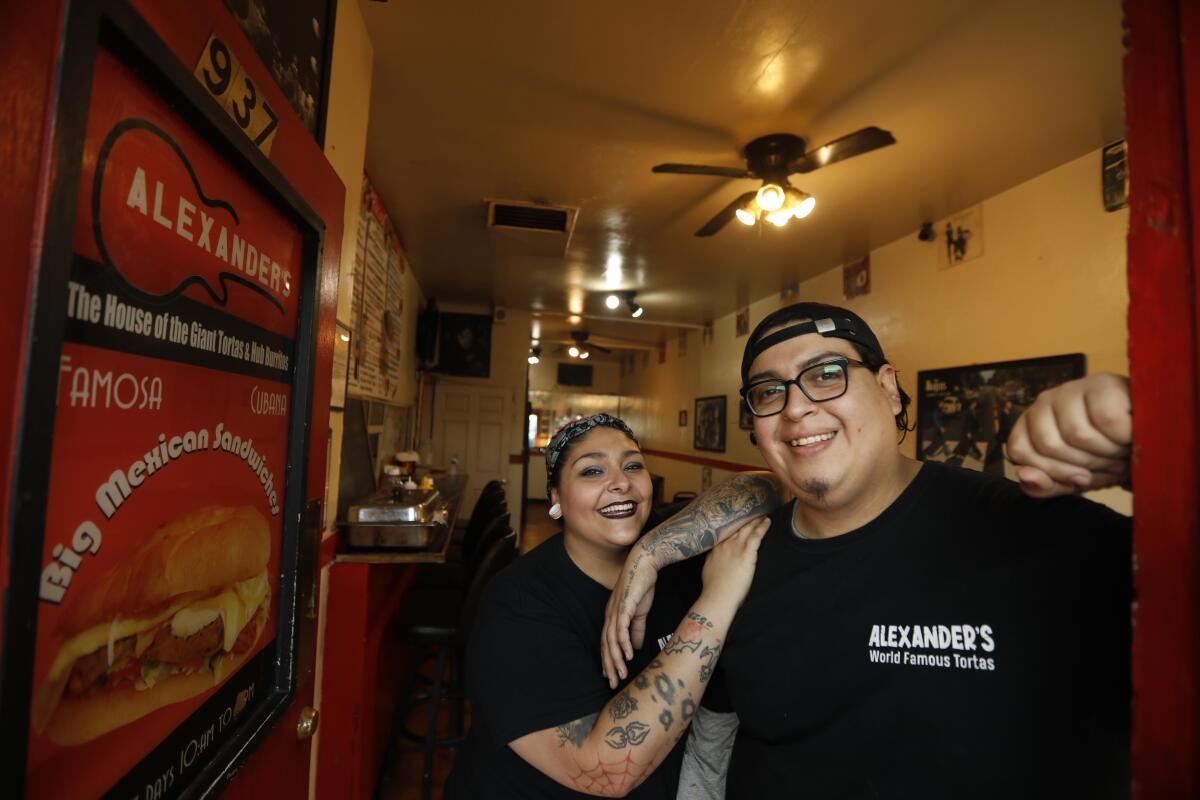 Angelina Rodriguez and husband Omar Flores, co-owners of Alexander's Hub Burritos