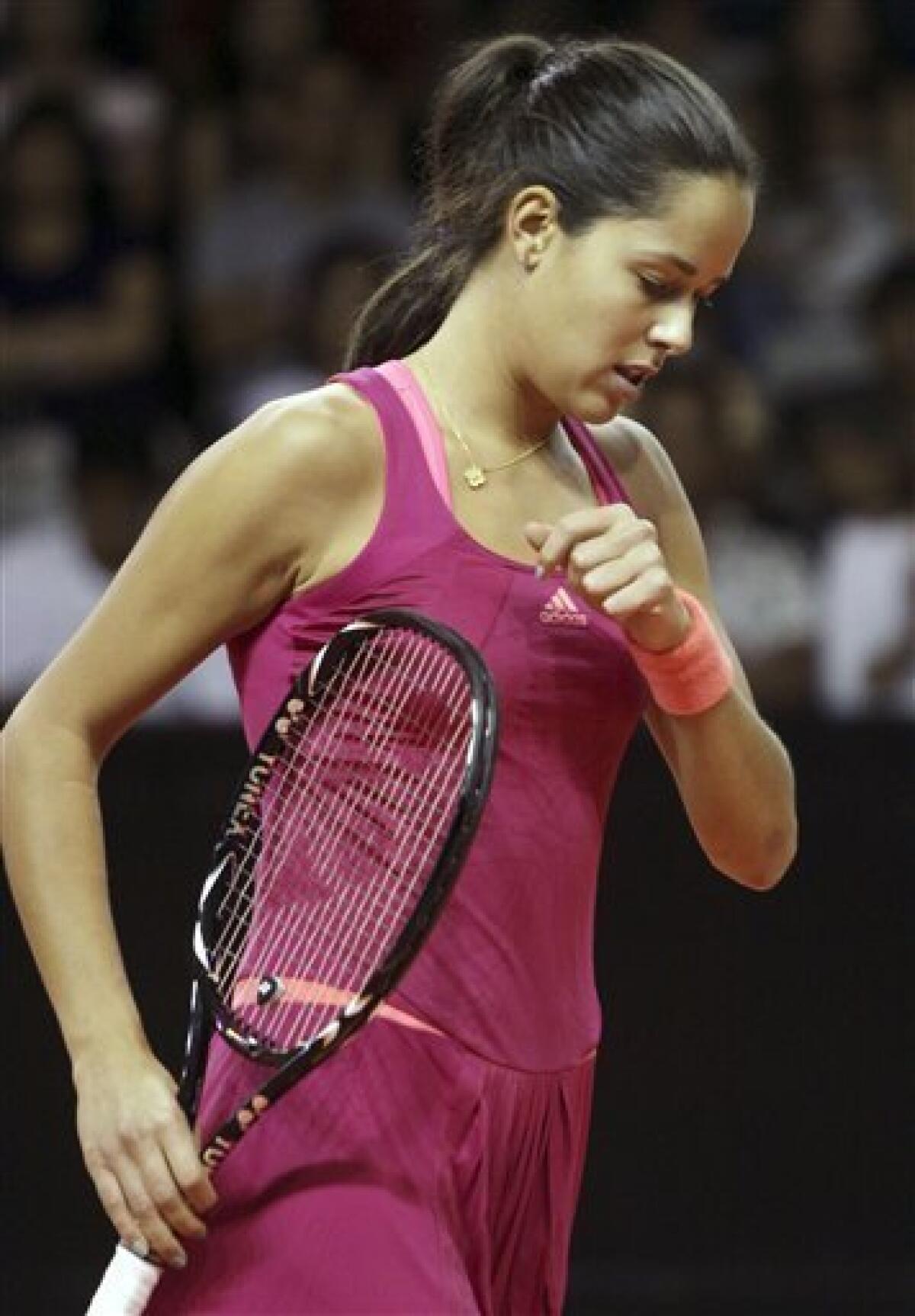 Ana Ivanovic of Serbia reacts after she won a point against Nadia Petrova of Russia during the Bali Tournament of Champions semifinal tennis match in Nusa Dua, Bali, Indonesia, Saturday, Nov. 5, 2011. Ivanovic won, 6-1, 7-5. (AP Photo/Firdia Lisnawati)