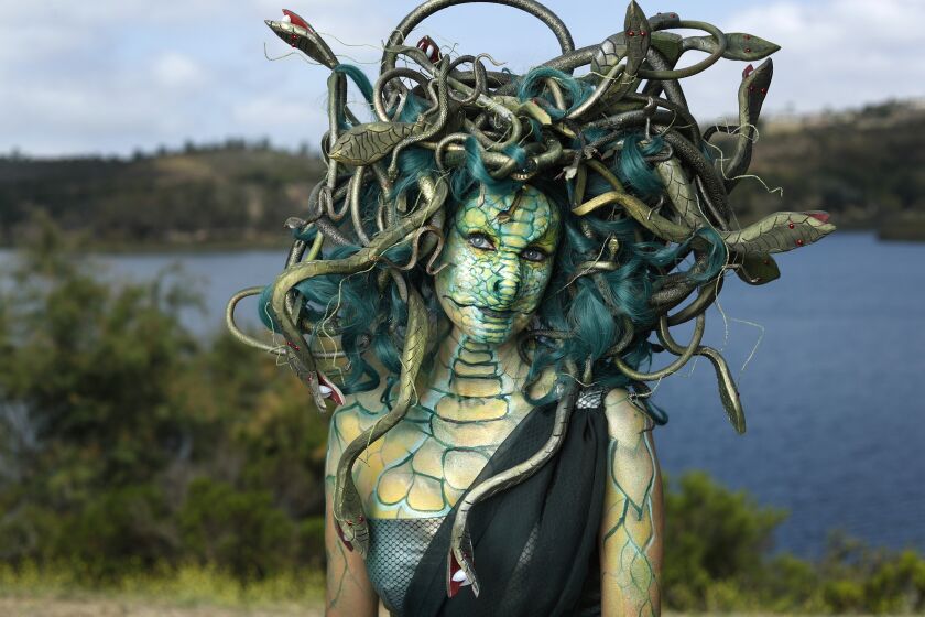 Sheila Noseworthy dressed as Medusa at Lake Miramar. Noseworthy took a month to make this outfit out of foam, and Dollar Store finds. She has been going to Comic-Con for ten years, and says it is one of the best places to people watch, even if you don't have a ticket. "Going in cosplay gives you a license to go chat with other cosplay people and makes you appreciate all the arts and comics," she added.
