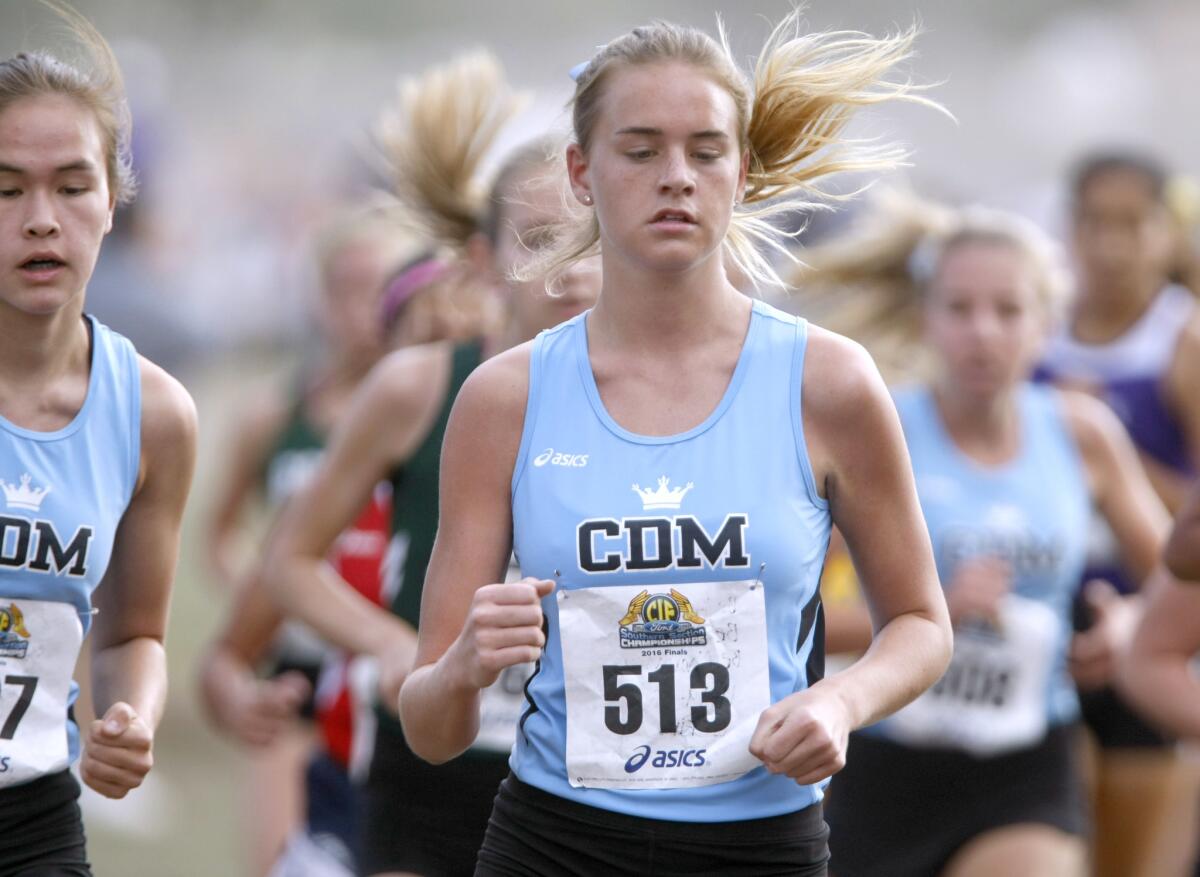 Corona Del Mar High School's Emma St. Geme runs in the Girls Division 3, CIF Southern Section Championships Cross Country Finals at Riverside City Cross Country Course in Riverside on Saturday.