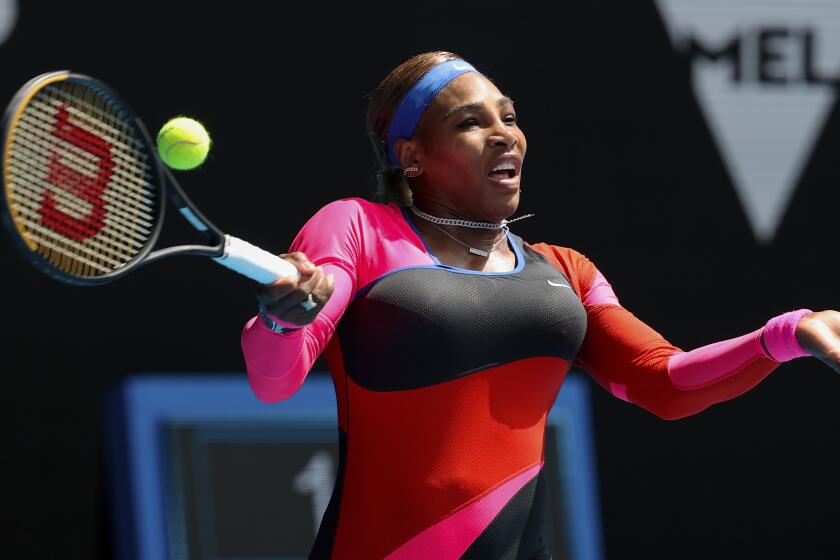 United States' Serena Williams hits a forehand return to Aryna Sabalenka of Belarus.