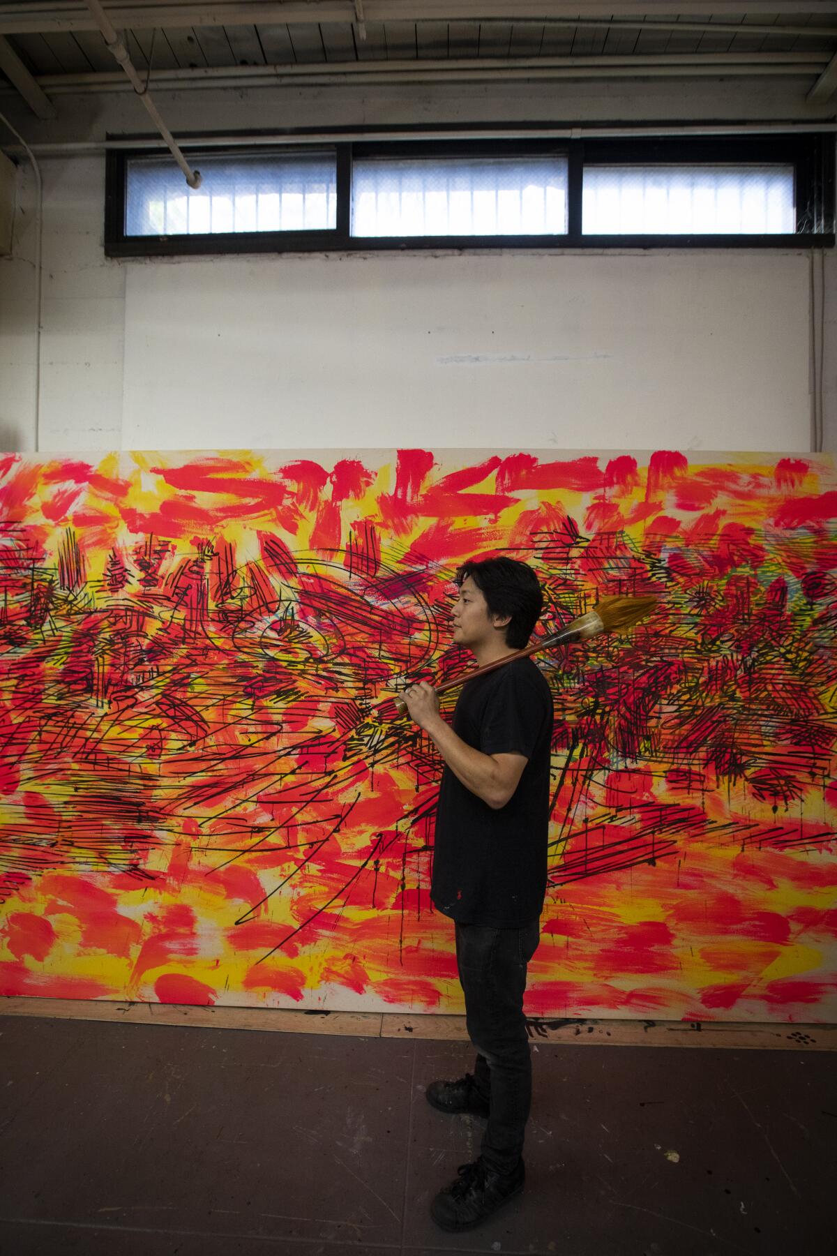 Artist Duke Choi, 30, in his space at Santa Fe Art Colony in Los Angeles.