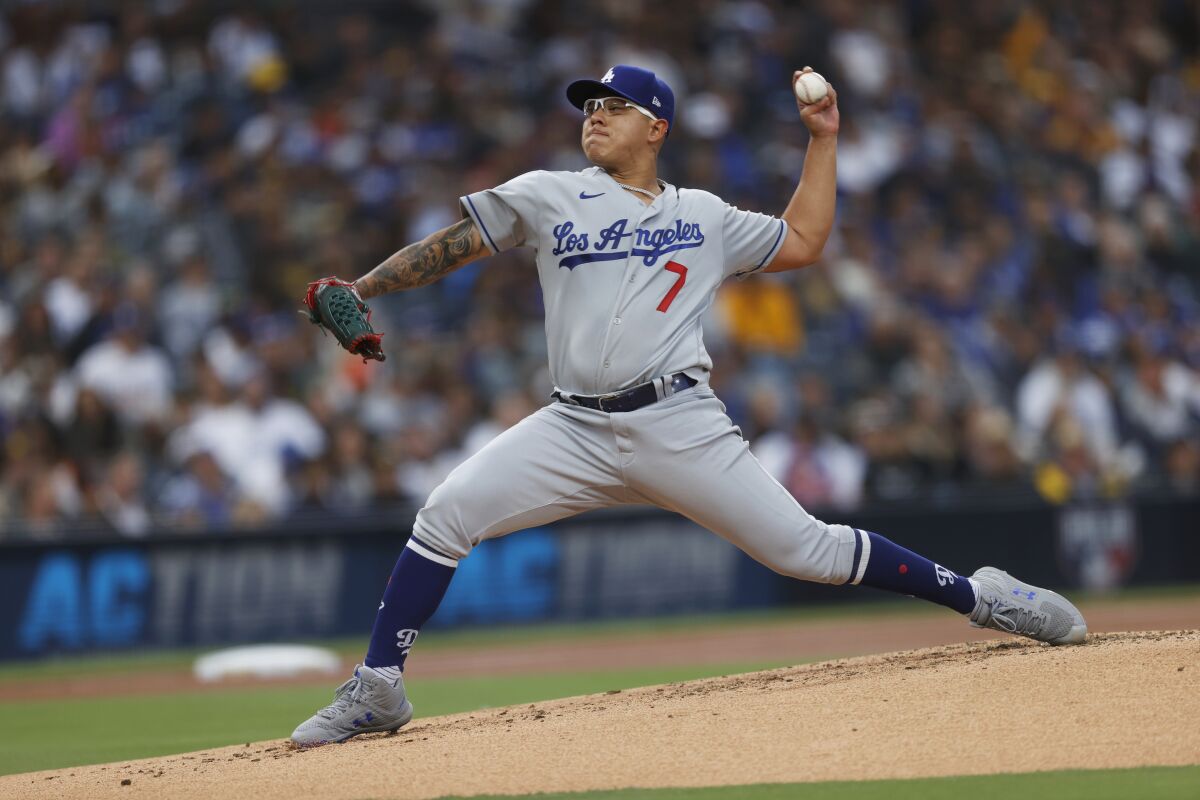 Dodgers starting pitcher Julio Urías delivers against the San Diego Padres in the first inning Friday.