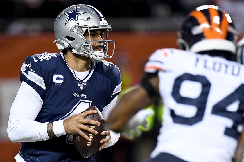 CHICAGO, ILLINOIS - DECEMBER 05: Quarterback Dak Prescott #4 of the Dallas Cowboys looks to pass against the defense of the Chicago Bears during the game at Soldier Field on December 05, 2019 in Chicago, Illinois. (Photo by Stacy Revere/Getty Images)