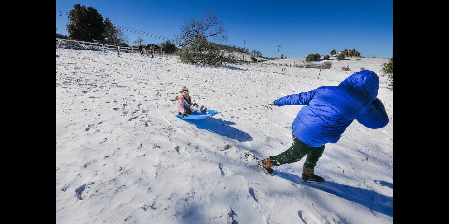 Playing in the snow on New Year's Day in Julian