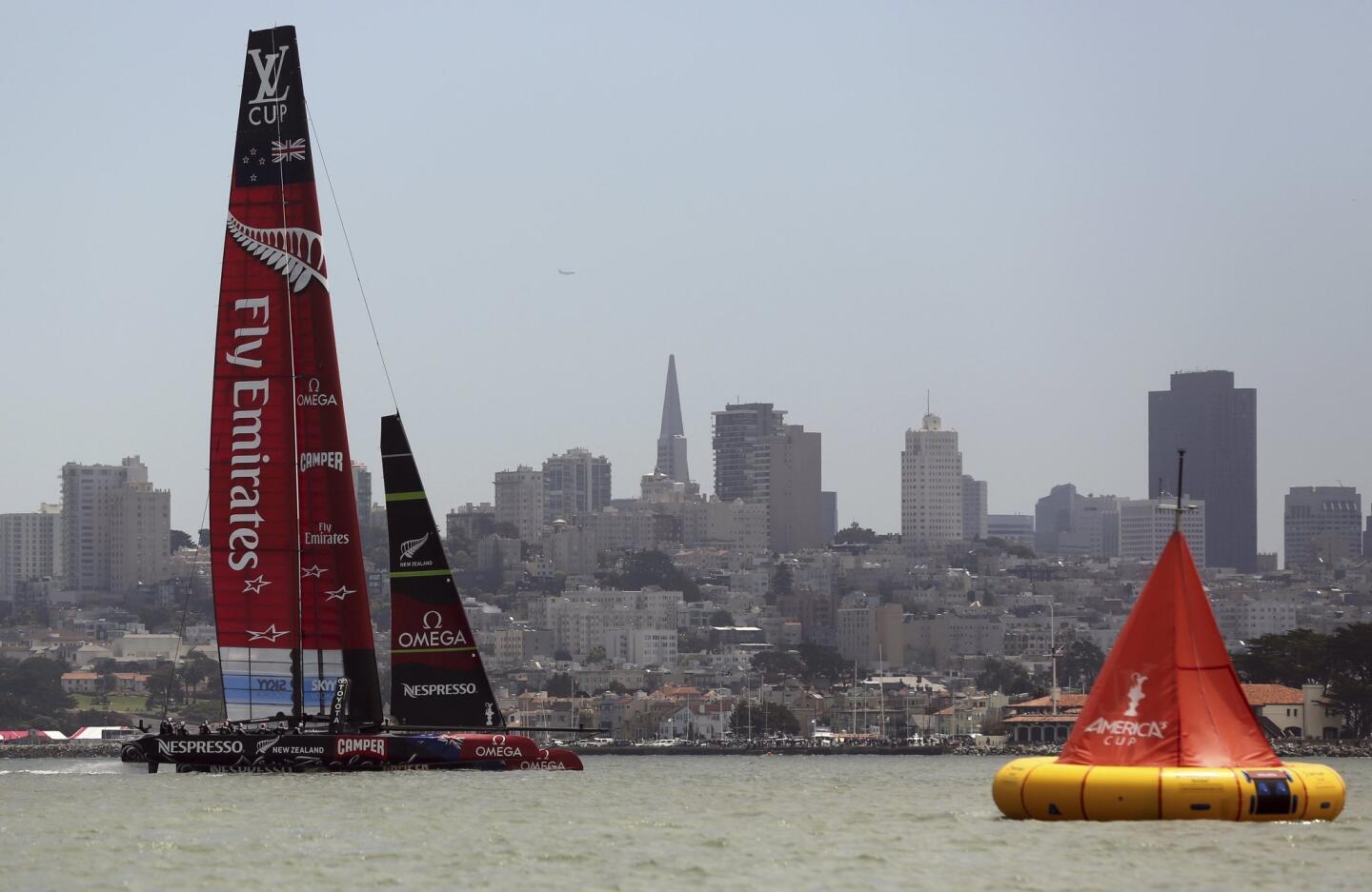 Emirates Team New Zealand sails toward a mark during the round robin one yacht races of the Luis Vuitton Cup challenger series in the 34th America's Cup in San Francisco